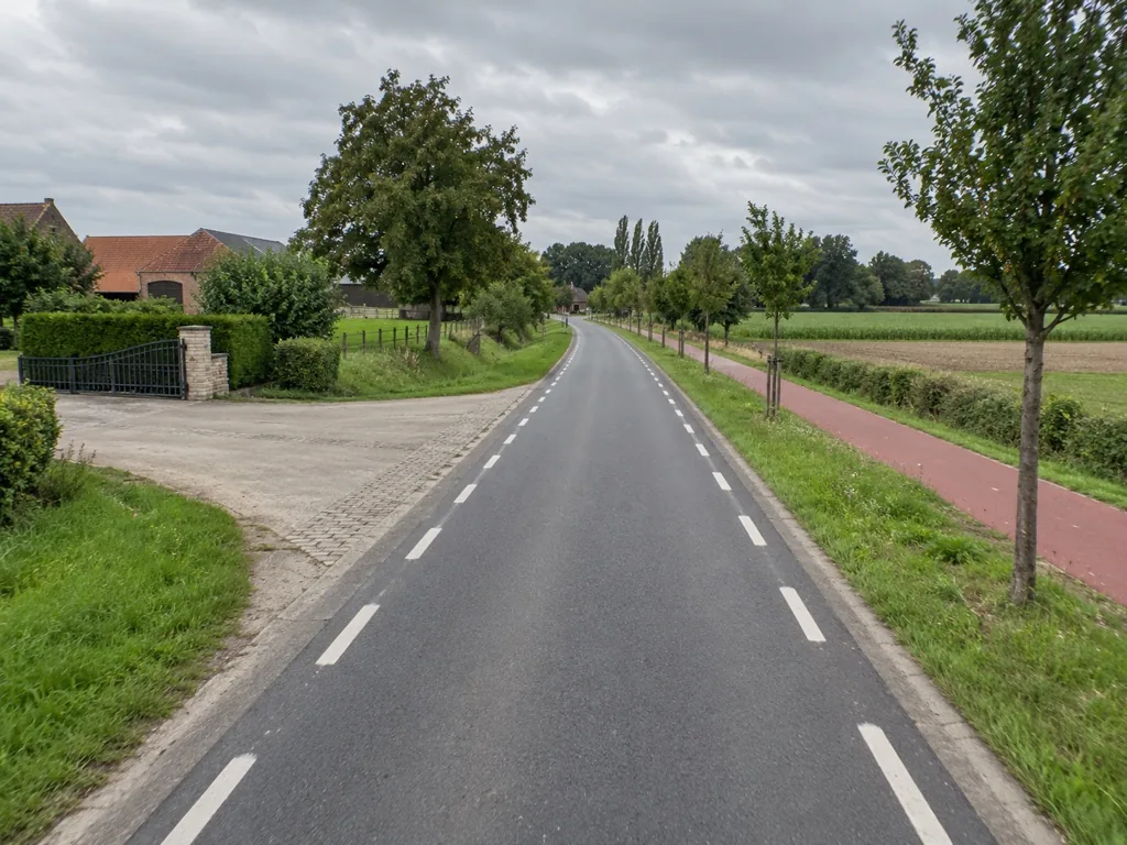 U wilt links afslaan met uw tractor. Wat doet u eerst?